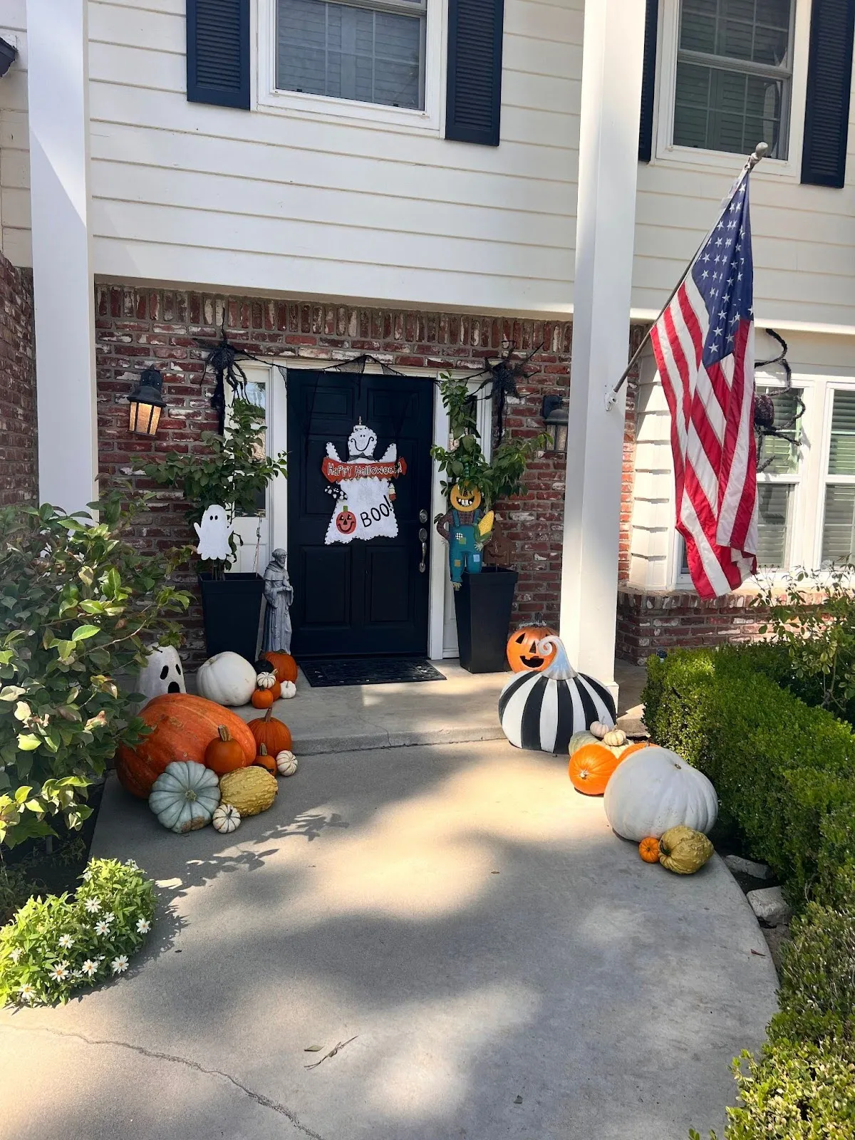 Decorated porch with seasonal pumpkins